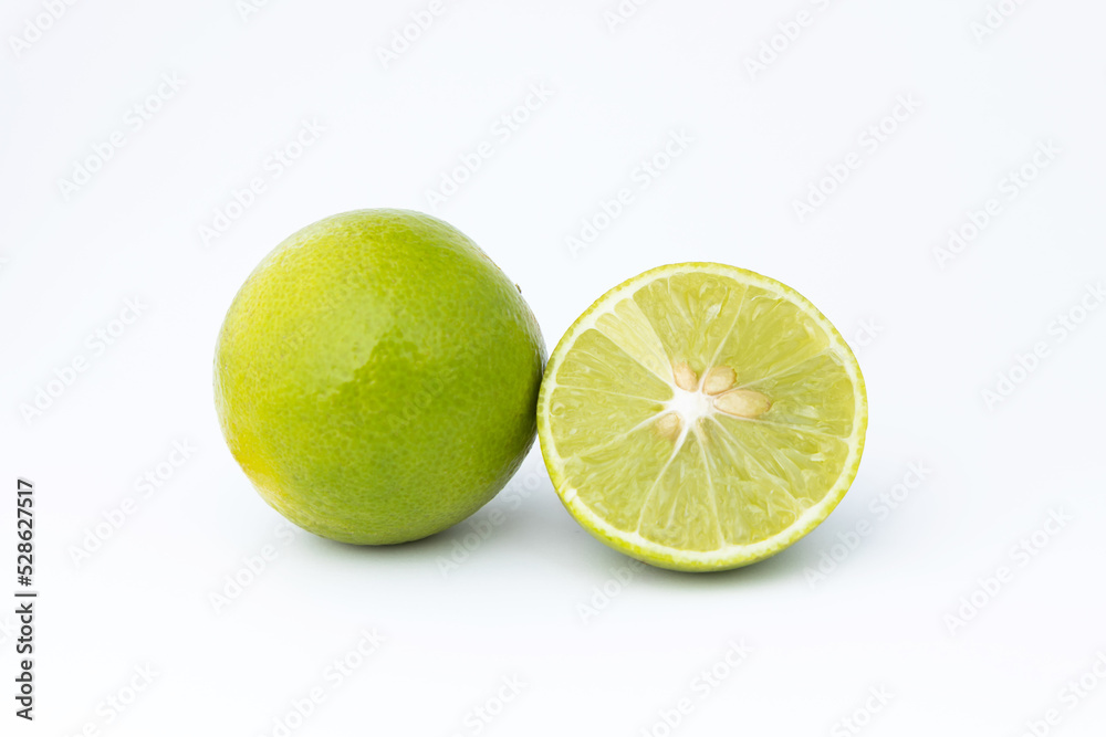 Fresh lime sliced isolated in white background. Fresh lemon sour fruit many vitamin C ingredient for healthy lifestye food. Fresh lime sliced isolated in white background. Fresh lemon sour fruit many vitamin C ingredient for healthy lifestye food.