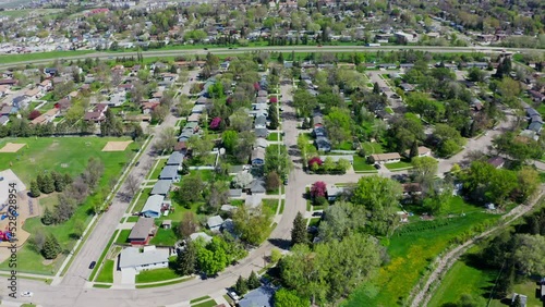 Beautiful City Landscape Aerial View With Houses And Roads On A Summer Day In Bismarck, North Dakota, USA. - Drone Shot photo