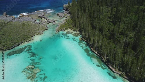 Wallpaper Mural The Natural Pool at Oro Bay on the Isle of Pines trickles into the Pacific Ocean - aerial flyover Torontodigital.ca