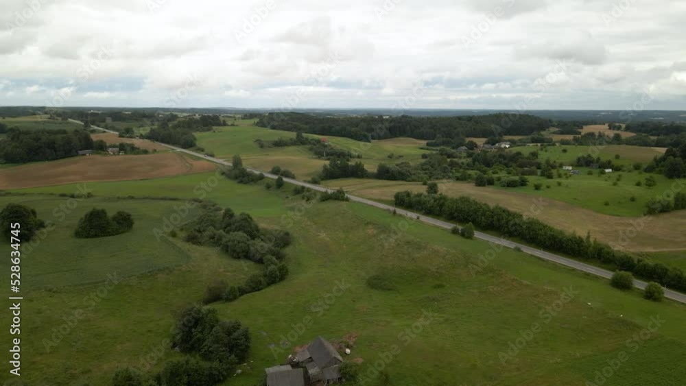 Aerial view of a landscape with green lush trees and grass Aerial view of a landscape with green lush trees and grass