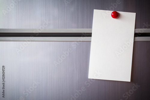 Empty paper sheet on refrigerator door. Note paper with magnetic. Valentine send text love message.
