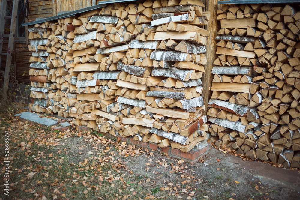 woodpile made of firewood in countryside in autumn woodpile made of firewood in countryside in autumn