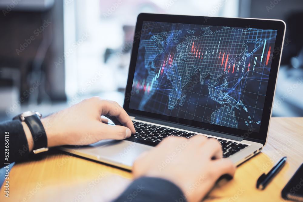 Close up of male hands using laptop keyboard with creative forex grid map on blurry background. Trade, finance, market and invest concept. Close up of male hands using laptop keyboard with creative forex grid map on blurry background. Trade, finance, market and invest concept.
