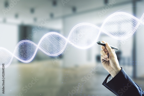 Man hand with pen working with virtual DNA symbol illustration on blurred interior background. Genome research concept. Multiexposure © Pixels Hunter