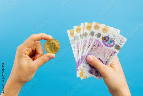 Close up woman's hands with money British pounds. Business and Finances concept. British pounds cash money. photo
