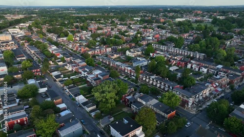 Urban city in USA. Downtown housing view in large town in America. Summer aerial in evening light. photo