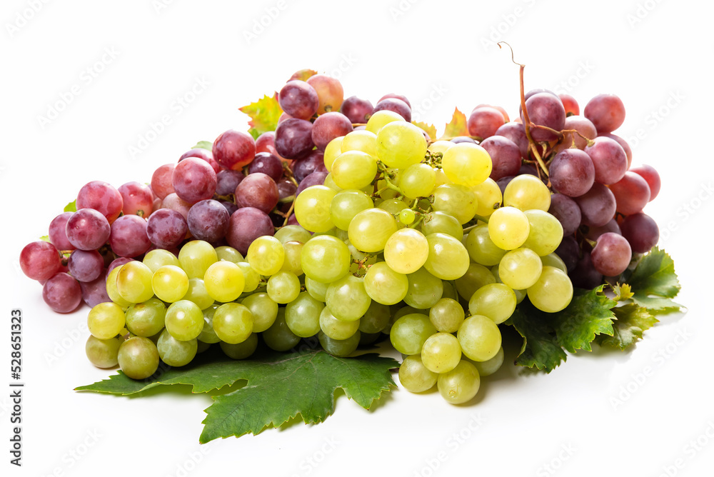 Clusters of white and pink grapes and grape leaves on a white background. isolate Clusters of white and pink grapes and grape leaves on a white background. isolate