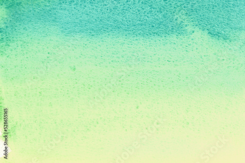 緑から黄色に変わっていく水彩画のグラデーション