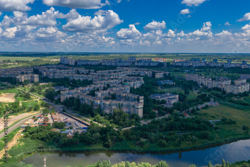 Ukrainian city of Krivoy Rog from above. Residential buildings, city center. Landmark of Ukraine. Aerial view of cityscape © Denis Chubchenko