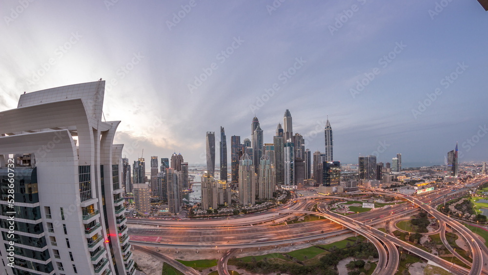 Obraz premium Dubai Marina highway intersection spaghetti junction day to night timelapse