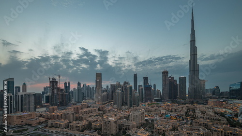 Dubai Downtown day to night transition timelapse with tallest skyscraper and other towers © neiezhmakov