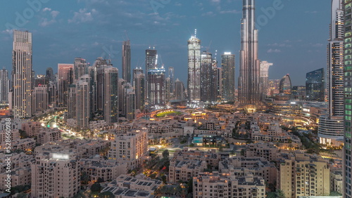 Dubai Downtown night to day timelapse with tallest skyscraper and other towers © neiezhmakov