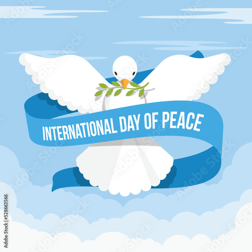 International day of peace - front view white dove of peace flying with blue ribbon roll around on blue sky background vector design