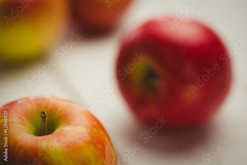 Red apples on table