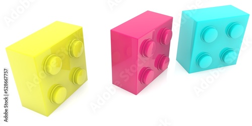Yellow, red and blue toy bricks next to each other