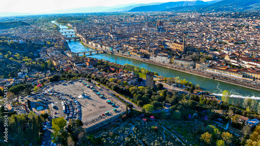 Florence beautiful aerial landscape and above panorama Ponte Vecchio, Palazzo Vecchio, Cathedral Santa Maria Del Fiore and Basilica di Santa Croce from Piazzale Michelangelo in Tuscany, Italy