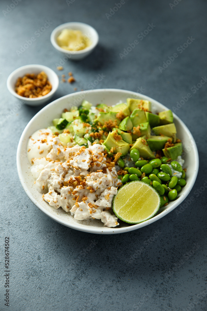 Homemade chicken bowl with rice and avocado