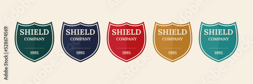 Shield badge design for business company certified. Security icon retro. Vector illustration defense emblem.