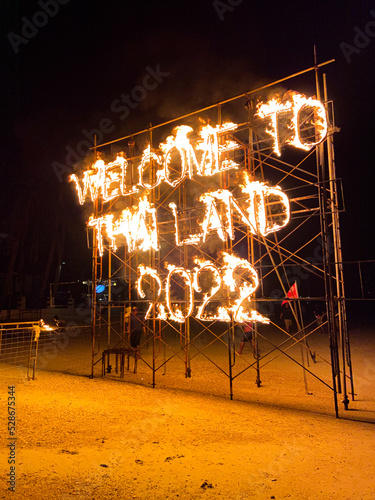 Welcome to Thailand 2022 full moon party in Haad Rin beach or Hat Rin in Ko Pha Ngan, Thailand photo