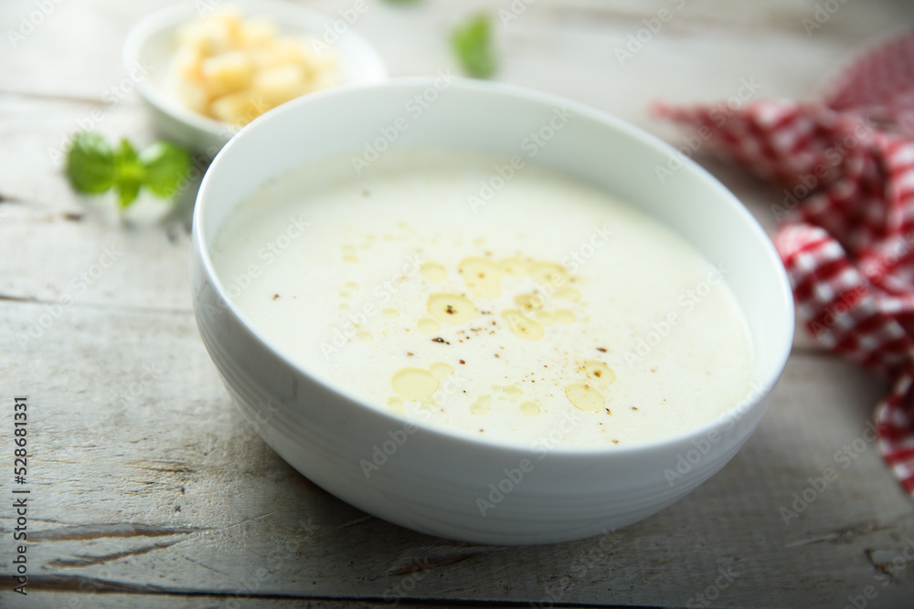 Traditional homemade cheese soup with croutons Traditional homemade cheese soup with croutons