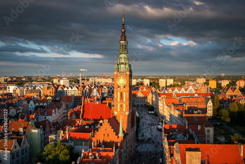 Beautiful architecture of the Main Town Hall of Gdansk in the rays of the setting sun. Poland
