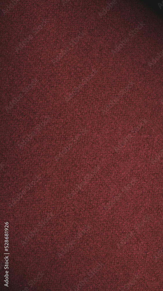 Dark red colored paper texture. Vertical brown tinted background. Mobile phone wallpaper. Textured surface, fibers and irregularities are visible. Vignetting Dark red colored paper texture. Vertical brown tinted background. Mobile phone wallpaper. Textured surface, fibers and irregularities are visible. Vignetting