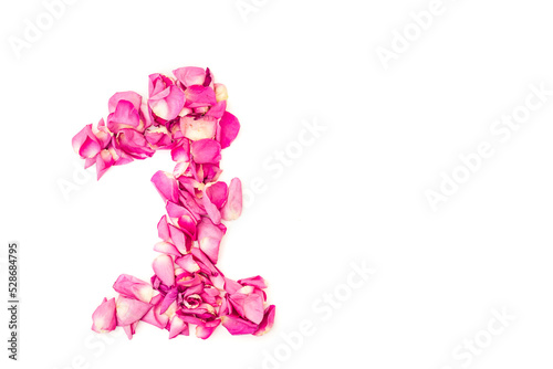 number 1 made from pink petals rose. Pink roses. Element for decoration.