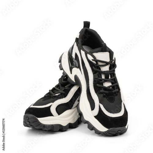 Sneakers. Sport shoes isolated on white background. Black sneakers running shoes. Casual shoes. Youth style. Shoes for fitness, running, yoga. Casual style.