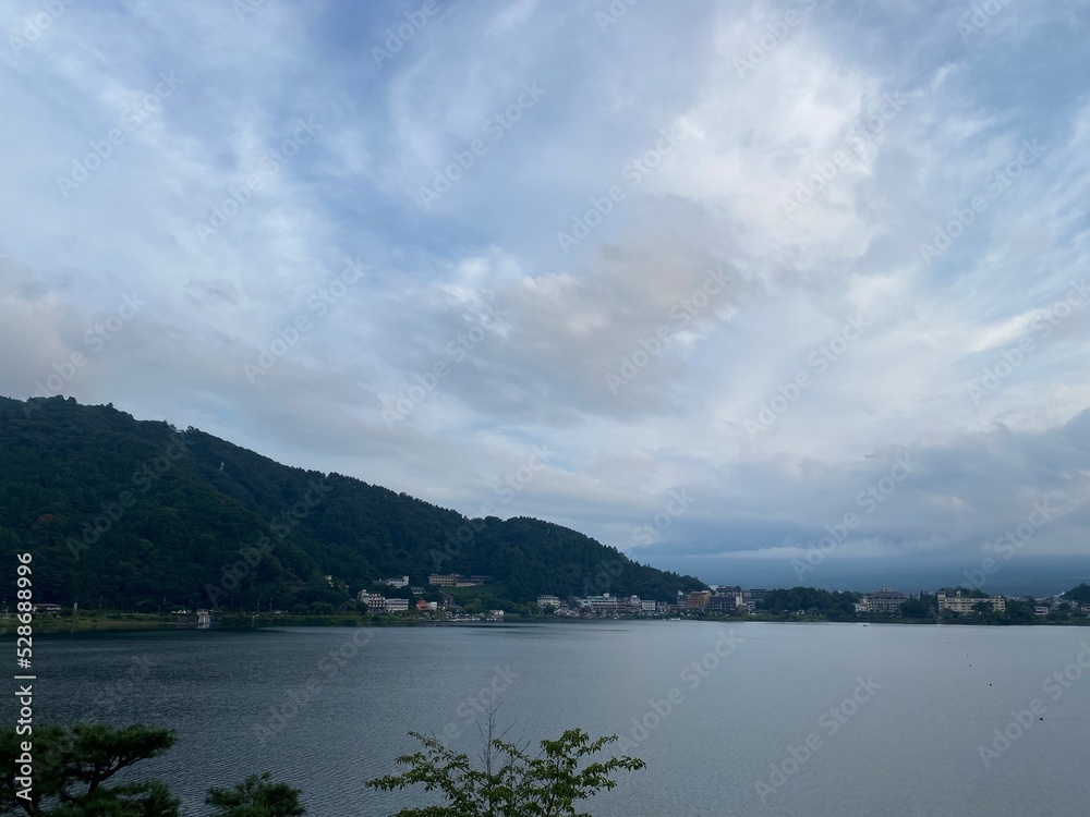 The sky and clouds of Kawaguchiko Yamanashi prefecture of Japan, view from the lake, year 2022 August 26th
