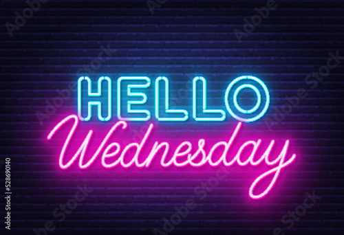 Hello Wednesday sign on brick wall background. photo
