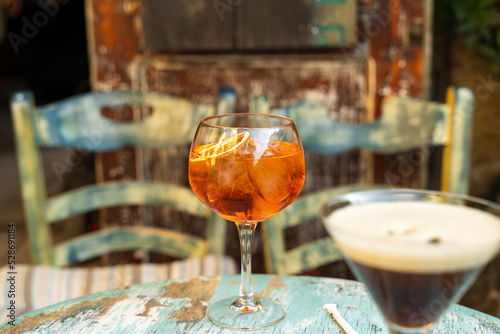 Orange Aperol Spritz cocktail on the table in the cafe