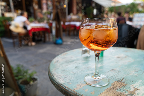 Refreshing alcohol drink on the table in a cafe photo