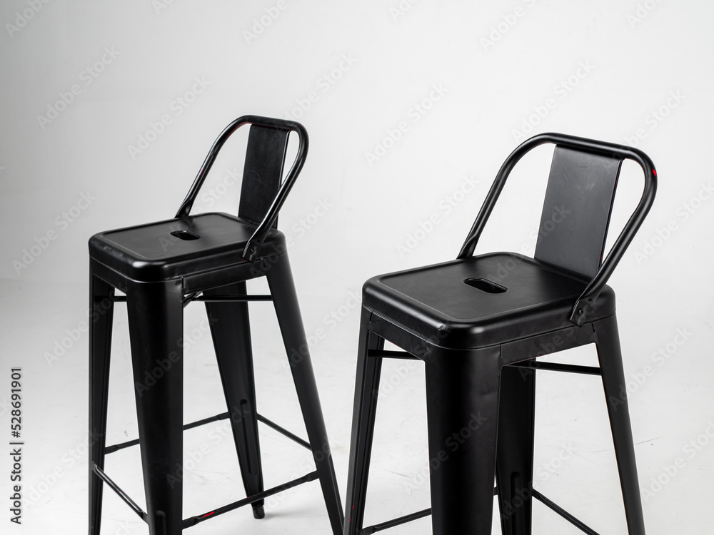 Black bar chairs on white background