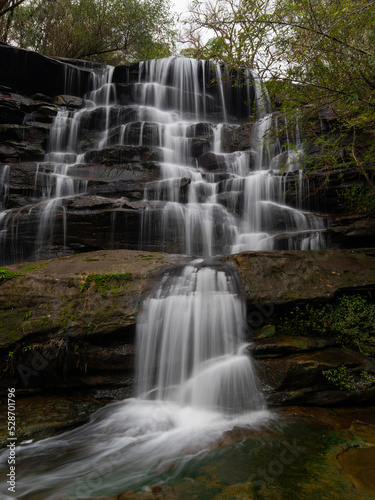 Fototapeta Naklejka Na Ścianę i Meble -  Beautiful water flowing in rocky cascade.