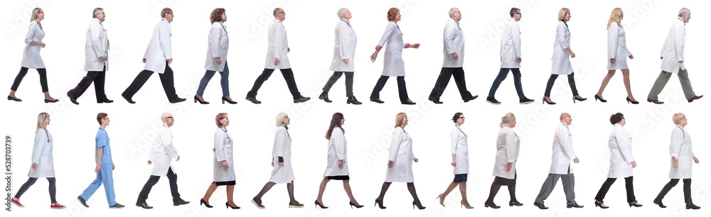 group of doctors in motion isolated on white group of doctors in motion isolated on white