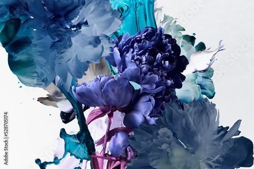 Blue peonies and blue splashes of paint, abstract floral background, blue and white color.
