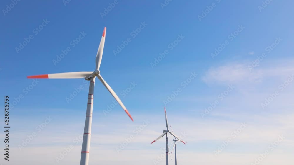 Green energy on wind turbines and wind turbines. Alternative energy sources and renewable energy sources. Power generation and generators of power plants.Wind farm and wind,environmental conservation Green energy on wind turbines and wind turbines. Alternative energy sources and renewable energy sources. Power generation and generators of power plants.Wind farm and wind,environmental conservation