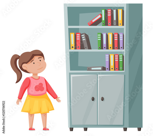 Young girl in casual clothing standing and looking up at bookcase with colorful books. Cute child looks at something behind her. Female kid alone isolated on white background in library or office