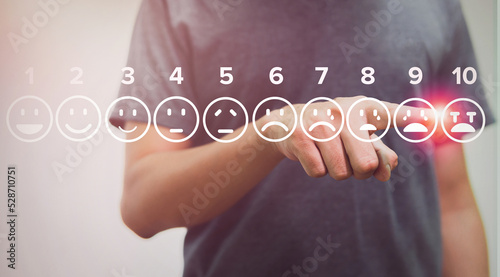man touching cry of pain scale icons virtual screen interface, medical technology and futuristic concept.