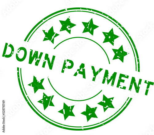 Grunge green down payment word with star icon round rubber seal stamp on white background