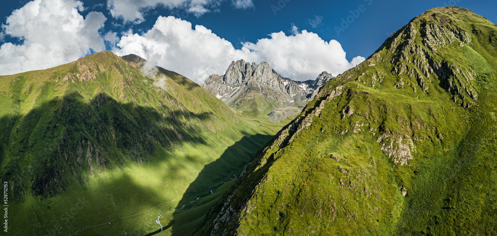 Mountain peaks and a stream, Georgia