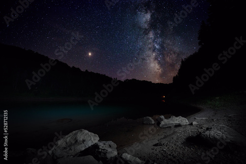 Obraz na płótnie Milky Way over a mountain lake, Georgia w salonie