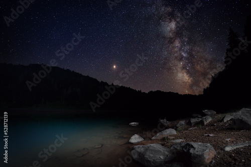 Obraz na płótnie Milky Way over a mountain lake, Georgia w salonie