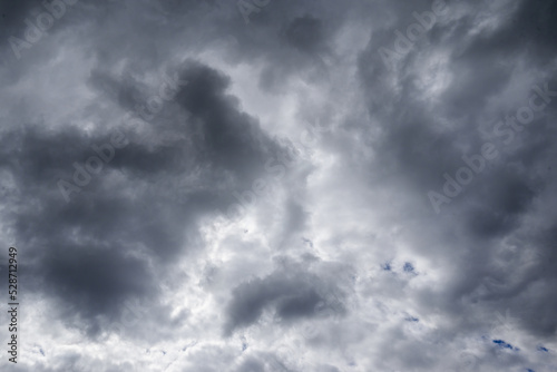 Fototapeta Naklejka Na Ścianę i Meble -  blue sky with gray storm clouds before rain