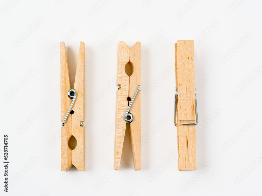 wooden spftwood pegs isolated on a white background wooden spftwood pegs isolated on a white background