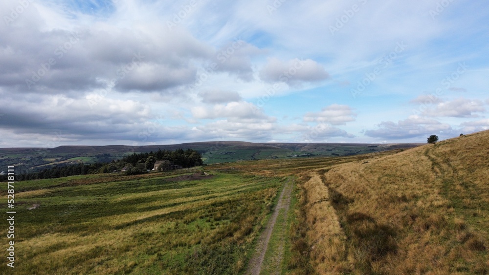 Aerial view of rural farmland with fields and grassland. Taken in Lancashire England. 