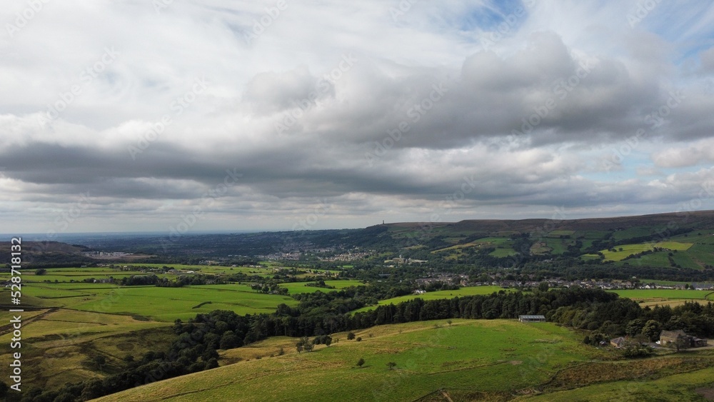 Aerial view of rural farmland with fields and grassland. Taken in Lancashire England. 