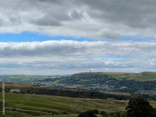 Village in the valley surrounded by hills and countryside. Taken in Lancashire England. 