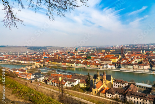 Panoramic view from the Marienberg Fortress of Würzburg's famous landmarks, like the bridge Alte Mainbrücke, the Marienkapelle, the Neumünster Collegiate, St. Kilian cathedral and the Grafeneckart. photo