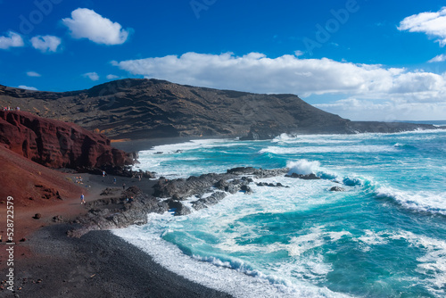 Lanzarote, Spain, 20 March 2022: The Atlantic Ocean at El Golfo black volcanic beach